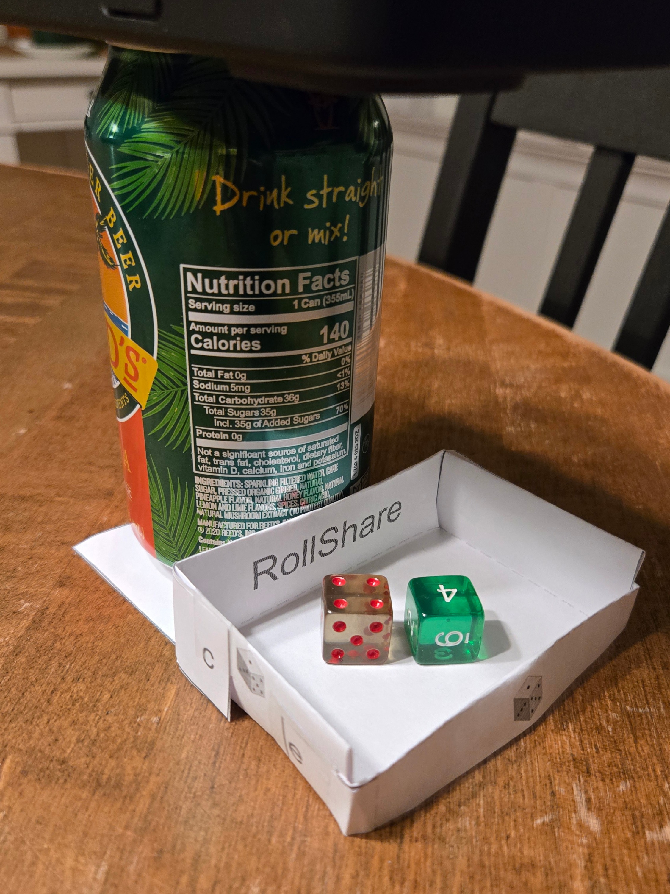 Phone on can above tray